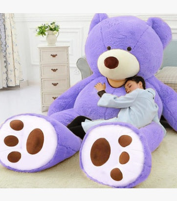 Soft giant blue teddy bear with a bow tie, perfect for kids and cuddles and gift giving